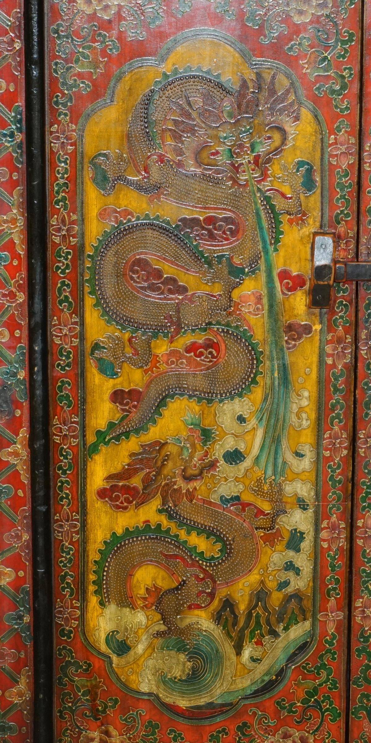 Vintage Chinese wardrobe painted with pagoda and drawers.