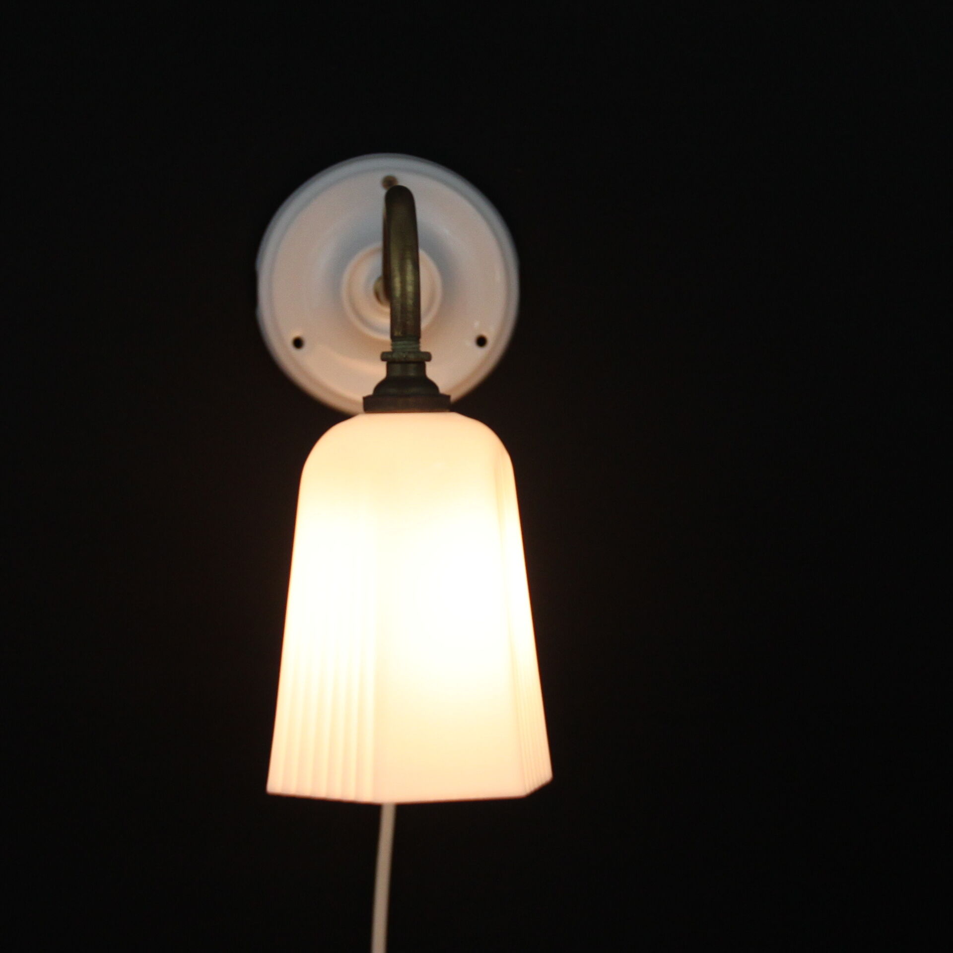 Brass, porcelain, opaline glass tulip swan neck wall lamp