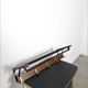 Vintage wooden wall coat rack with hooks and brass shelf