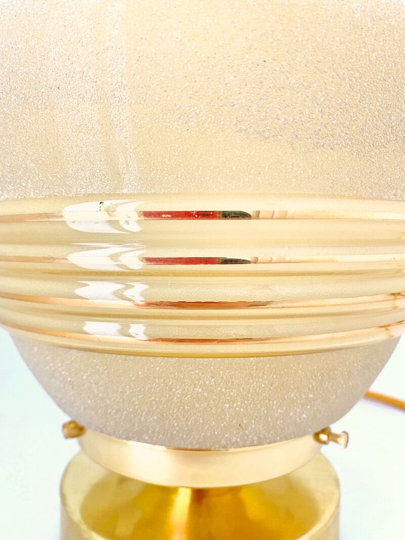 Old globe table lamp in beige and gold glass