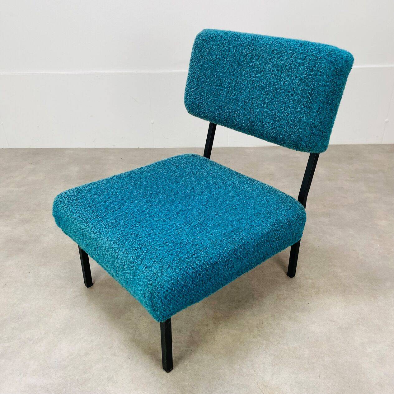 Modernist armchair from the 1950s in vintage blue boucle fabric.