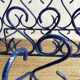 Pair of blue-painted wrought iron planters, 1960s