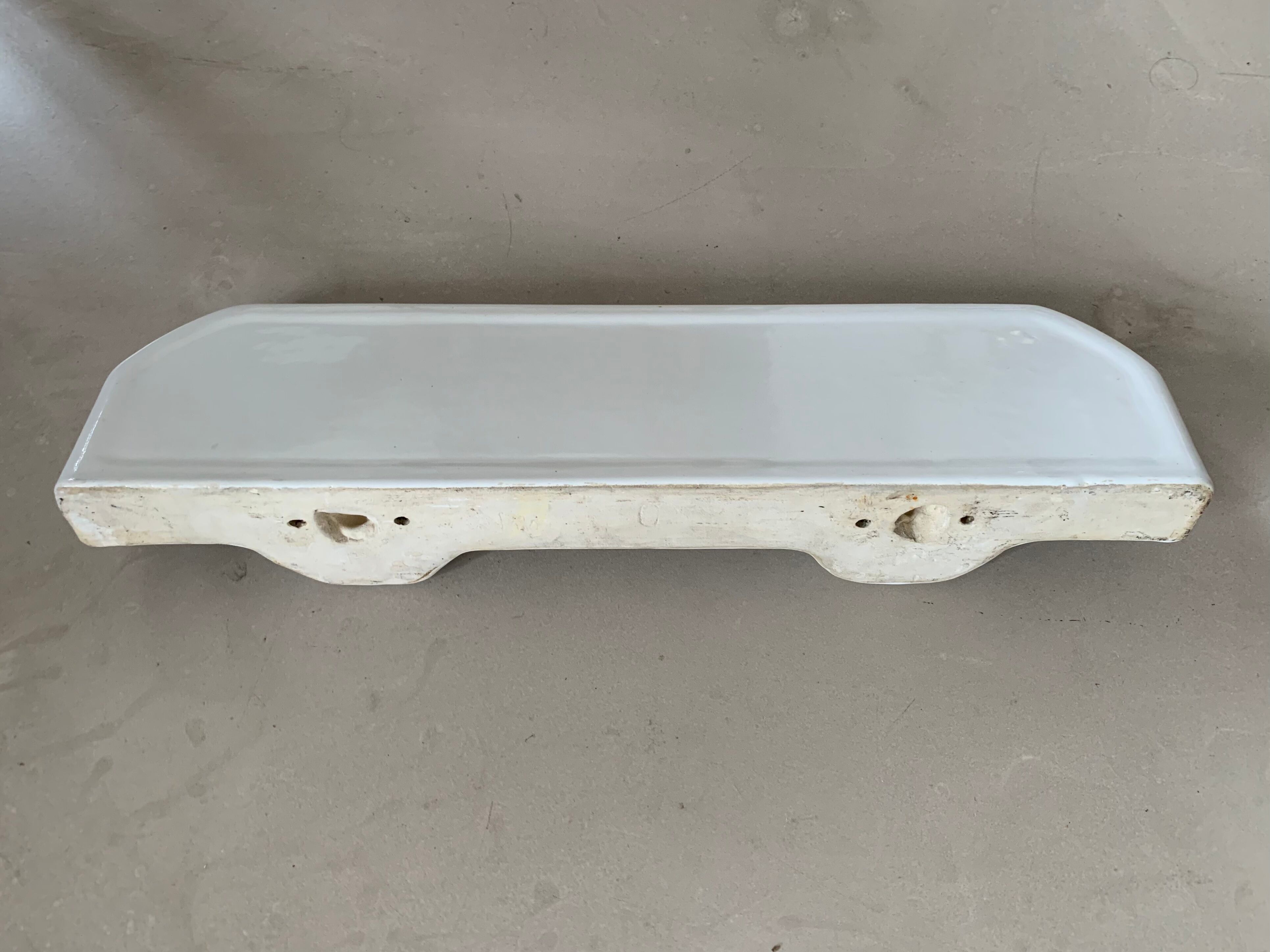 Antique ceramic wall shelf