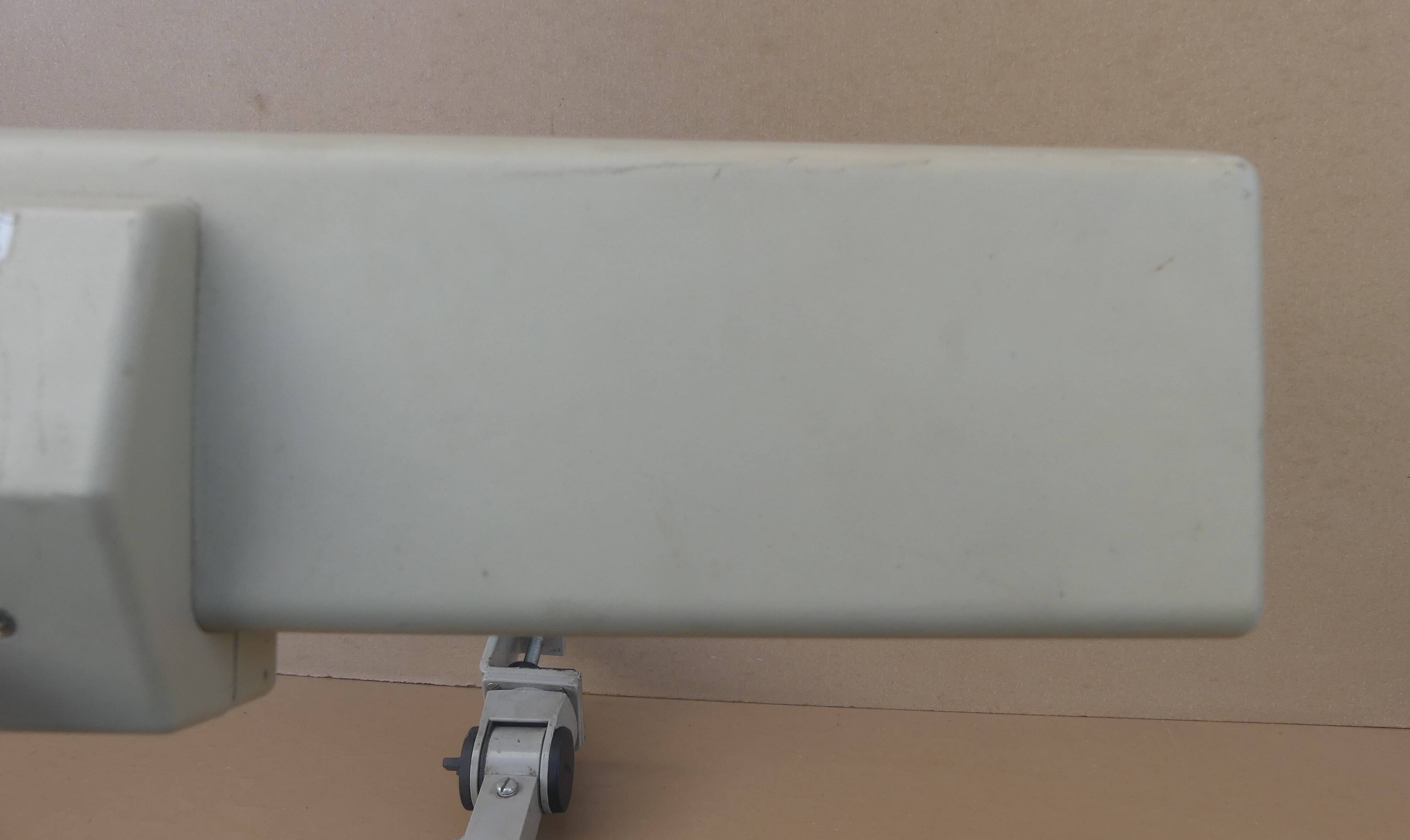 WALDMANN articulated workshop lamp with two industrial clamp arms for architects.