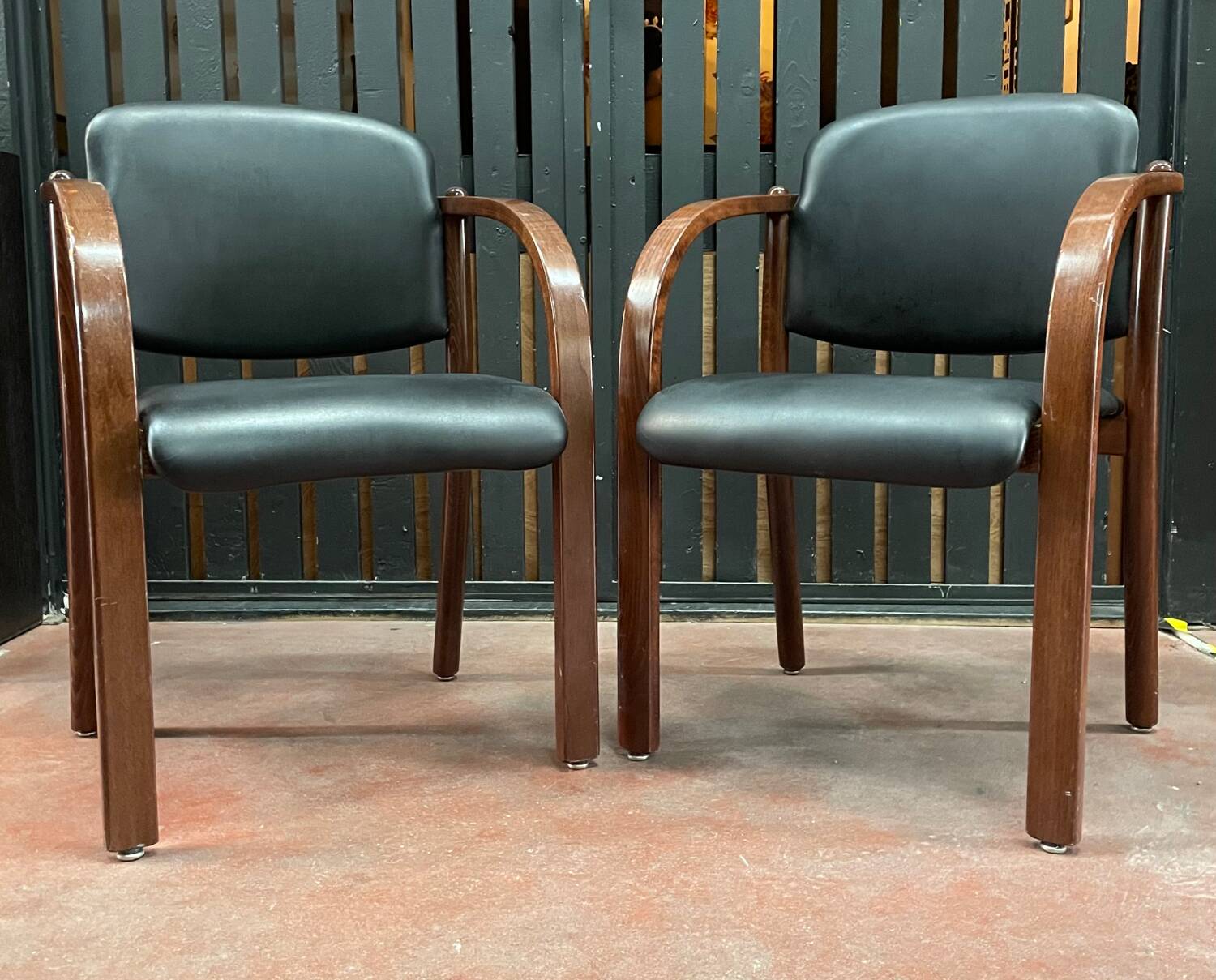 Pair of wooden and leatherette armchairs from the 80s