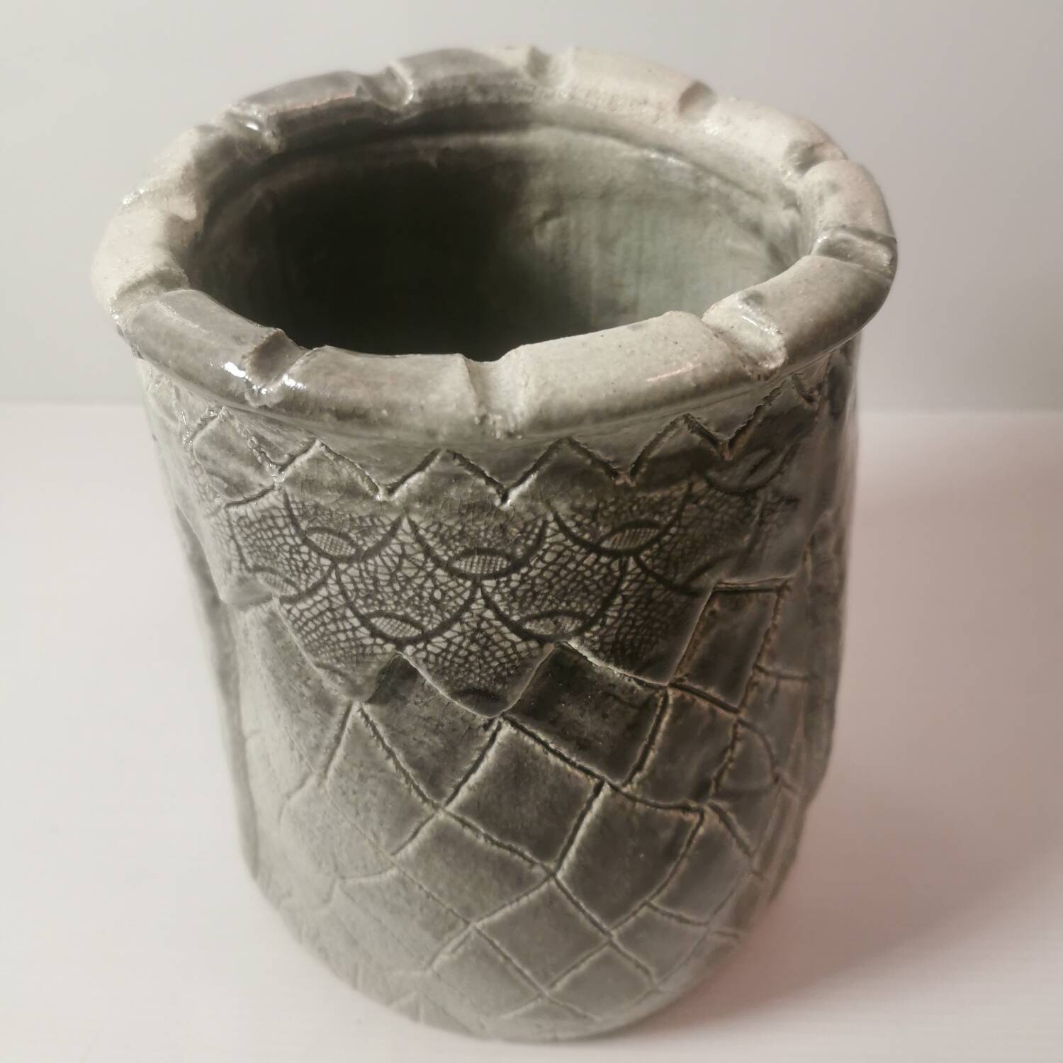 Ceramic vase or pot in gray beige color