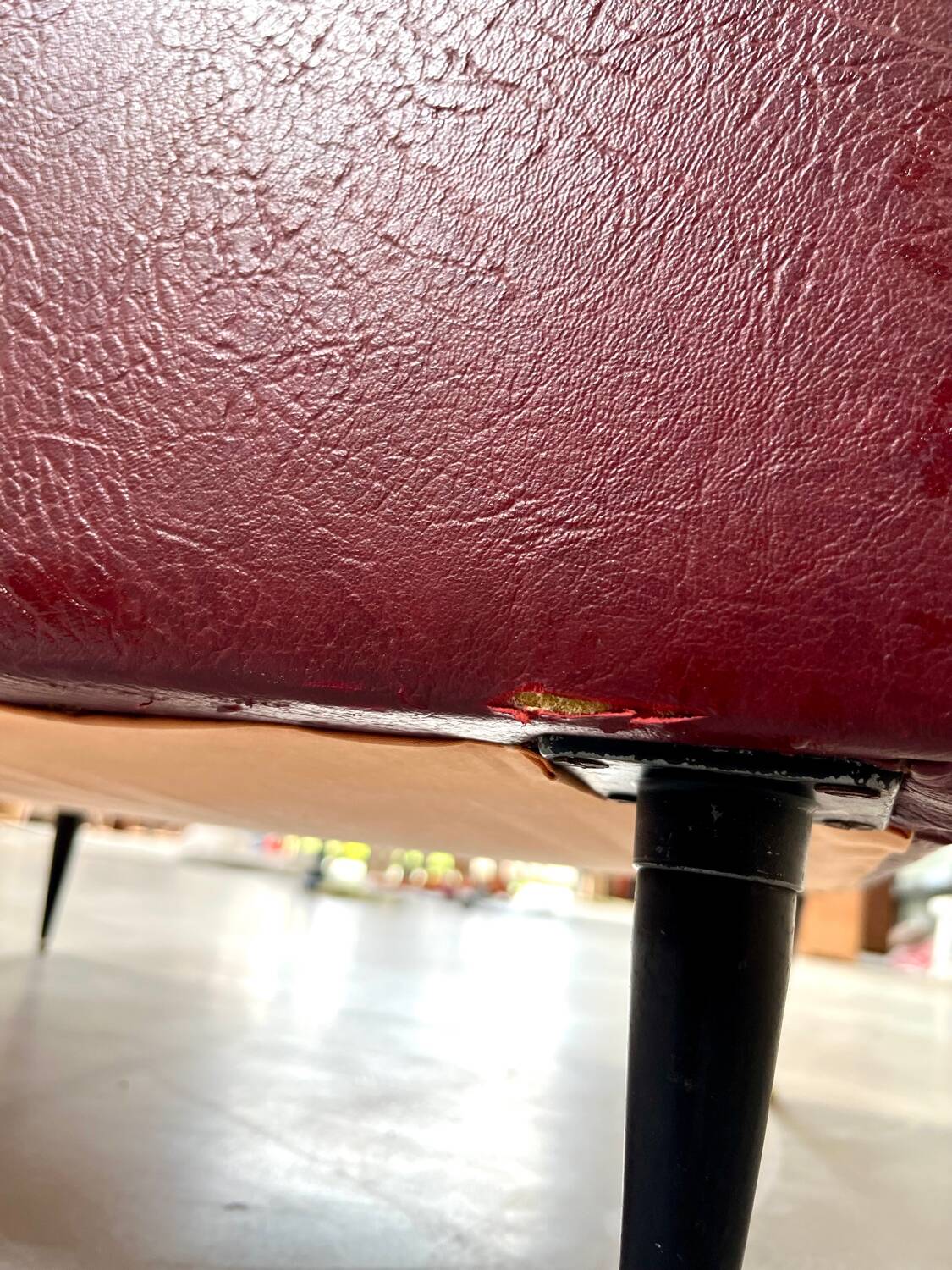 Vintage burgundy armchair, compass base in black metal and brass