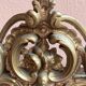 Napoleon-style mirror with a pediment