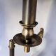 Brass reading floor lamp, adjustable arm, vintage anthracite shade.
