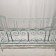 Old children's bed with metal bars