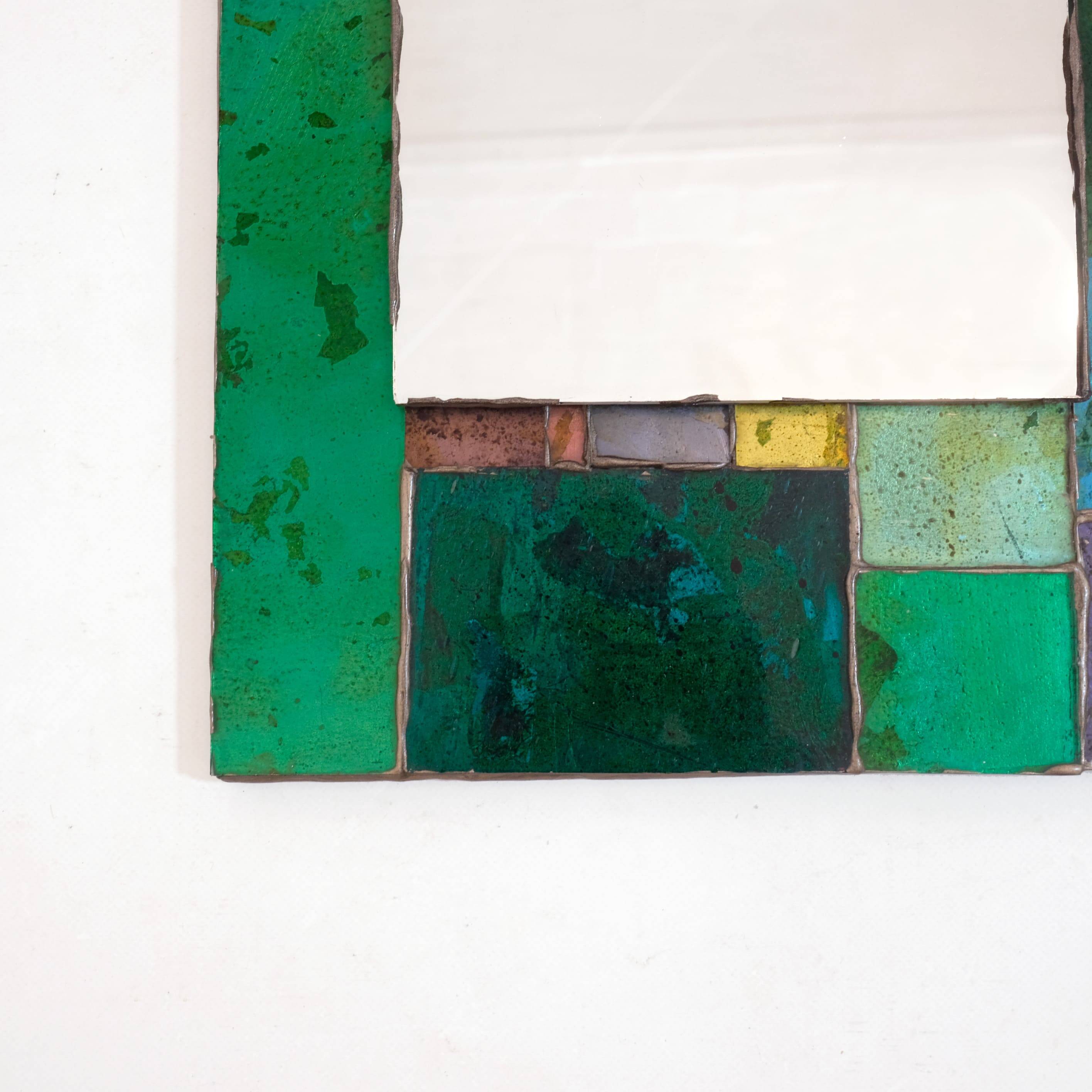 Coloured glass mirror, French work from the 1960s, 35x77 cm.