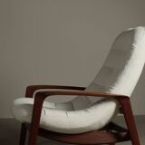 Vintage Teak "Scoop" chair with ottoman by R.Huber & Co