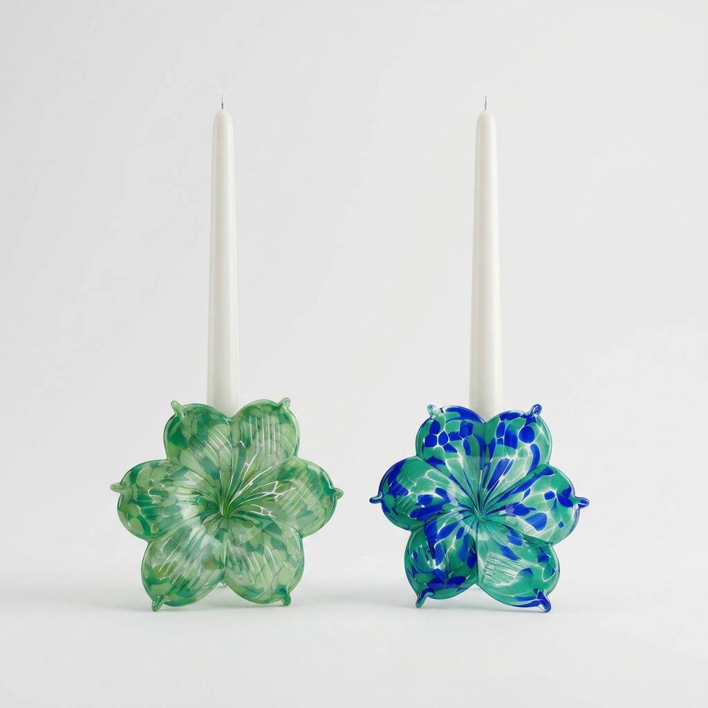 pair of flower candle holders in glass handmade in Italy.