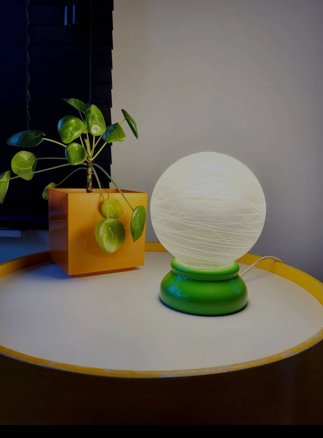 Vintage French table lamp with glass opaline shade and wooden green lamp base.