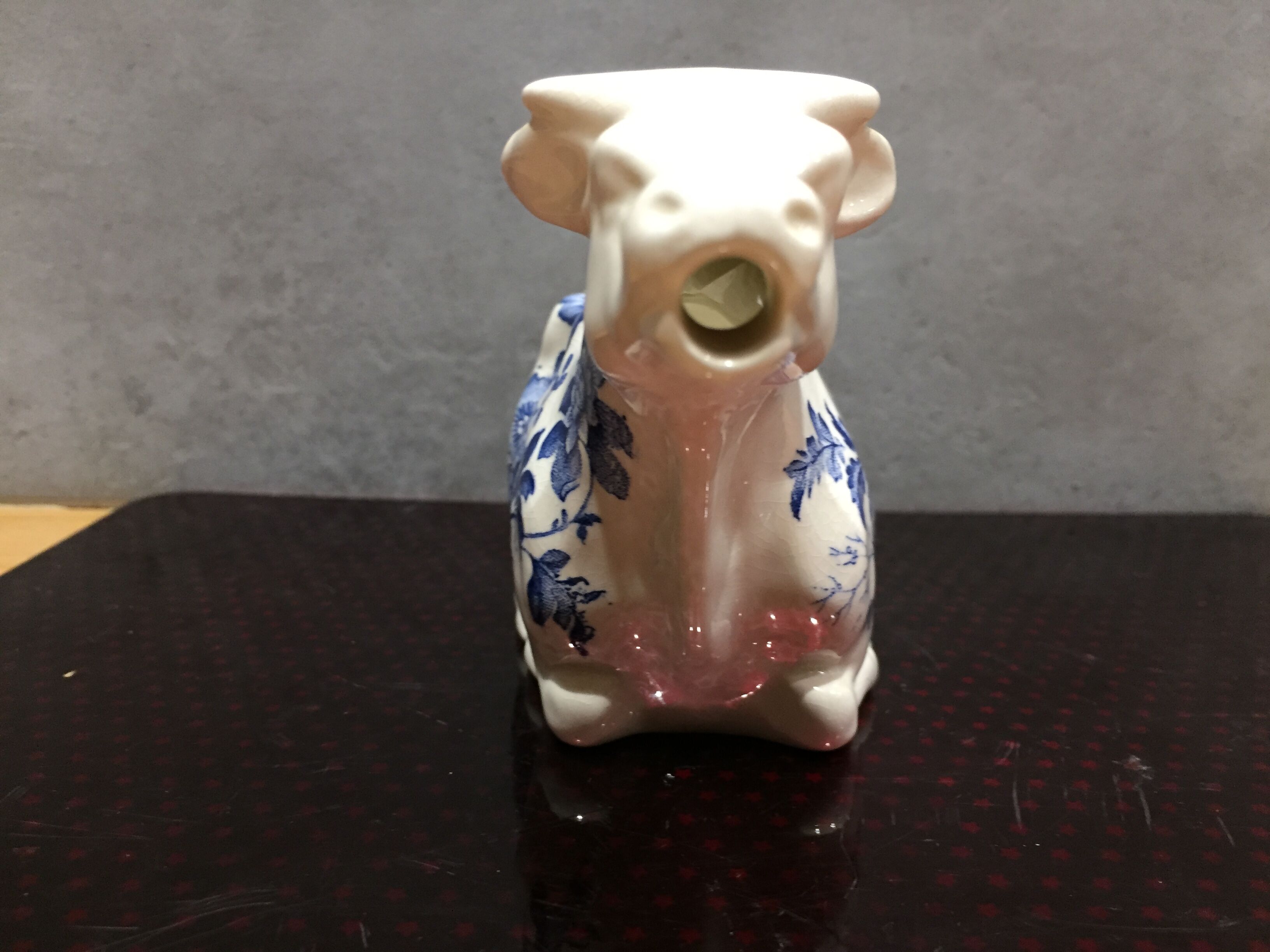 English porcelain cow-shaped sauce dish
