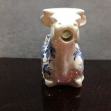English porcelain cow-shaped sauce dish