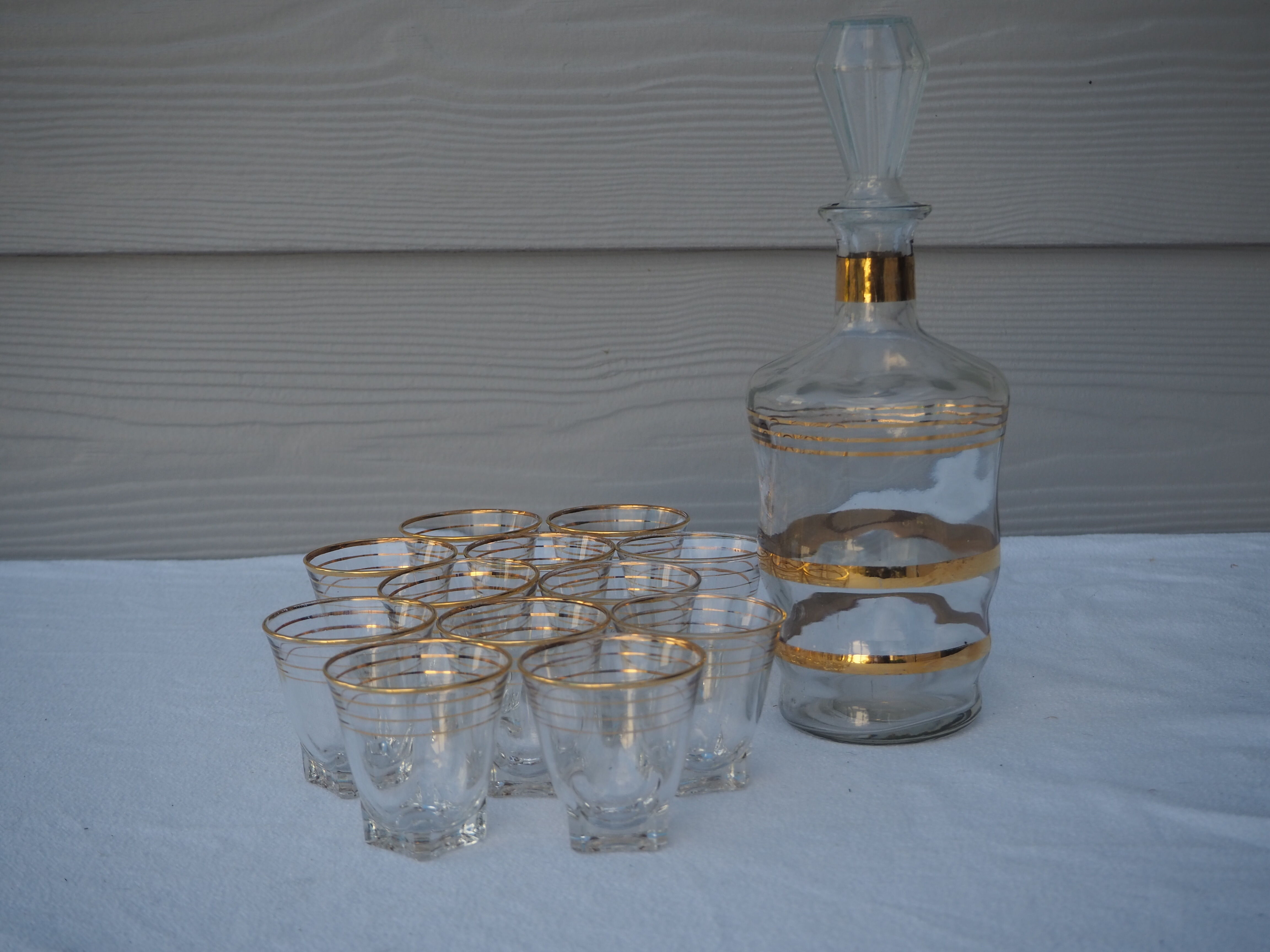 Golden liqueur service from the 1950s-1960s and its 12 glasses