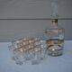 Golden liqueur service from the 1950s-1960s and its 12 glasses.