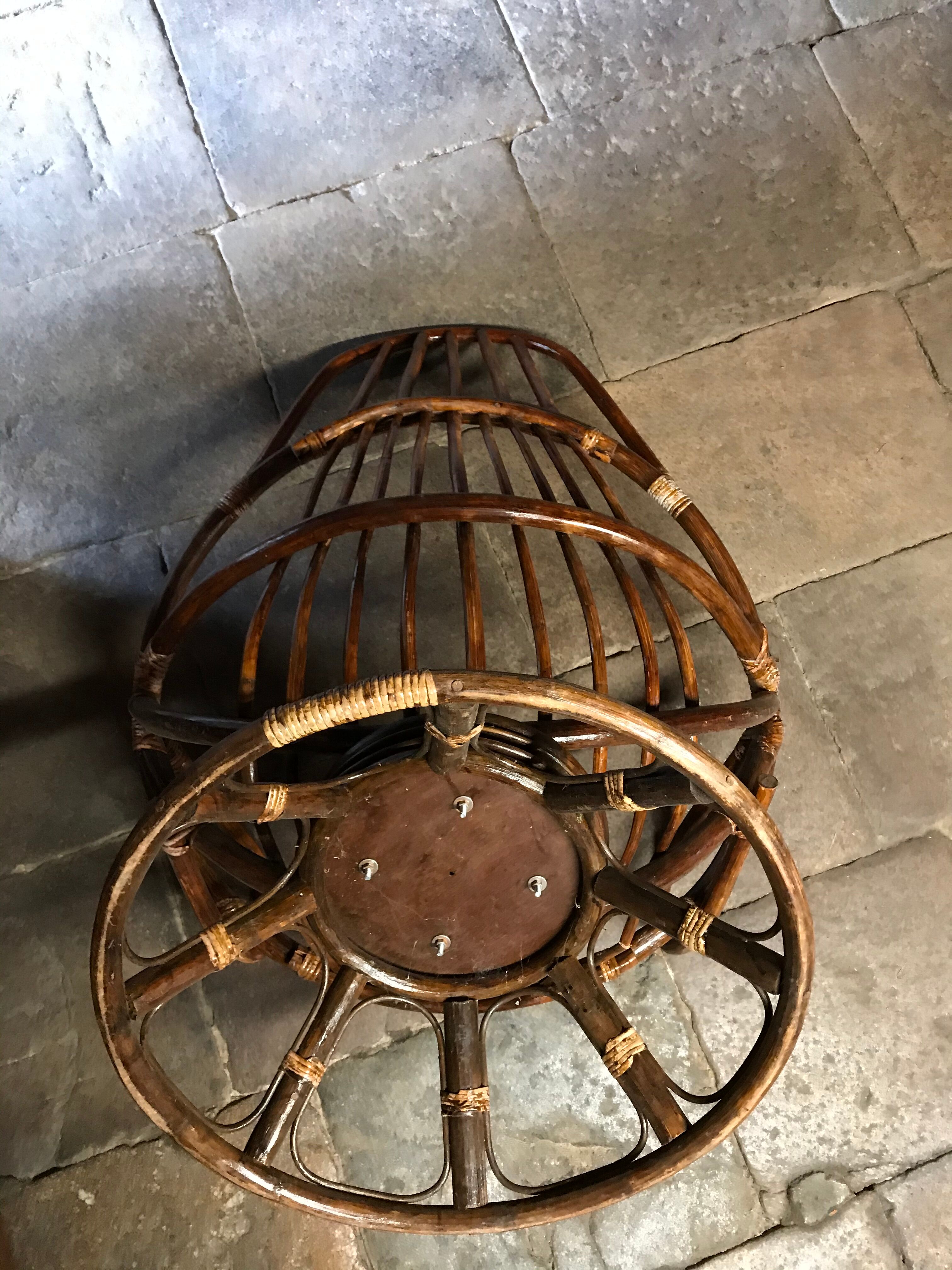 Swivel rattan armchair