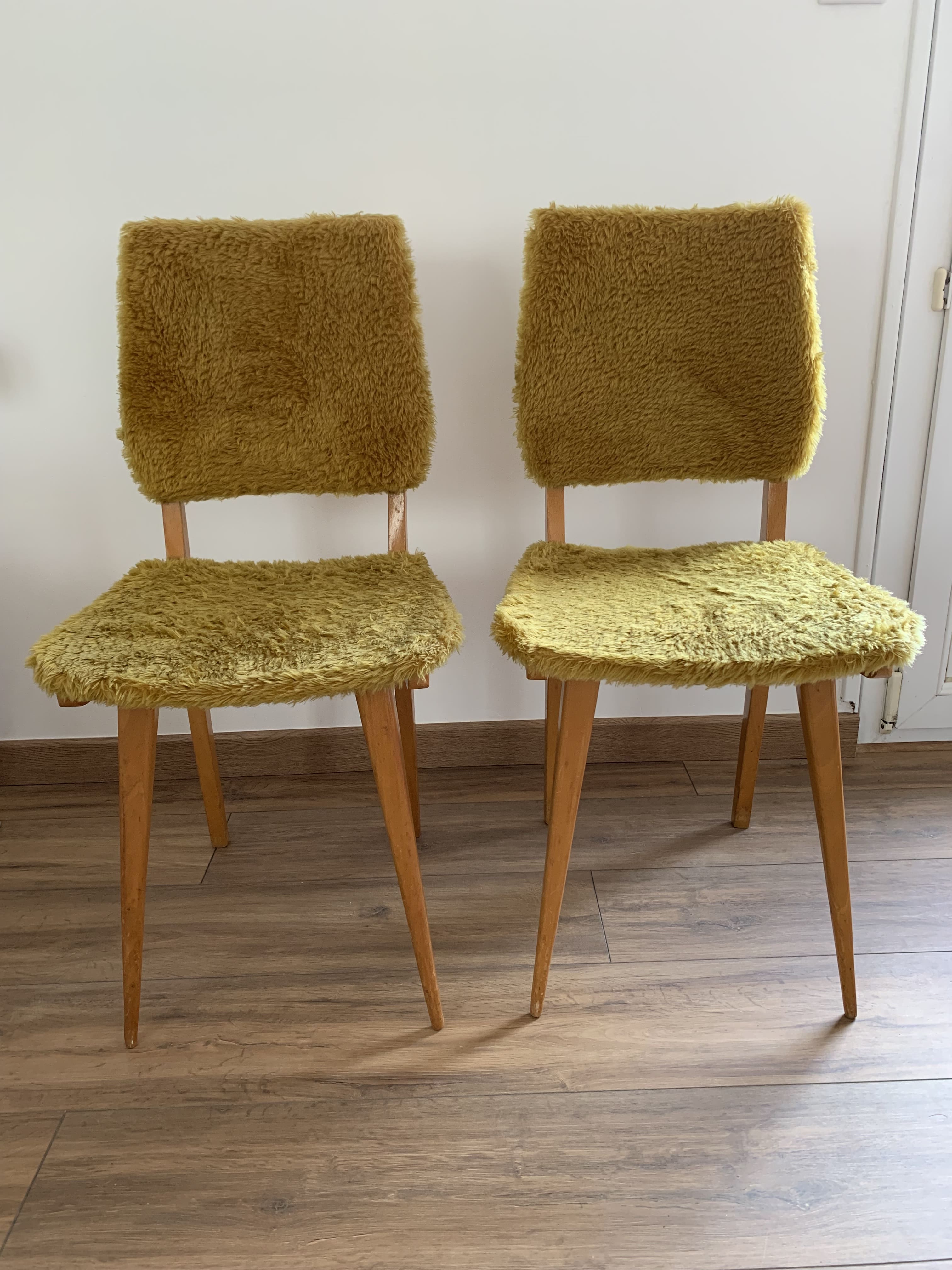 2 yellow moumoute chairs