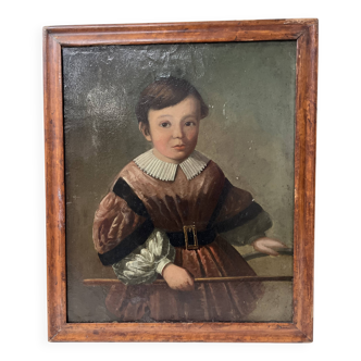 Huile sur toile représentant un jeune enfant XIX siècle