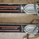 Old skis wooden and its pair of sticks
