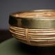 Rattan and brass fruit basket
