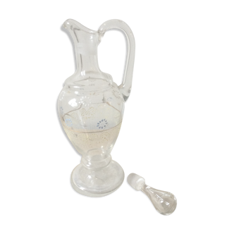 Antique decanter decorated by hand