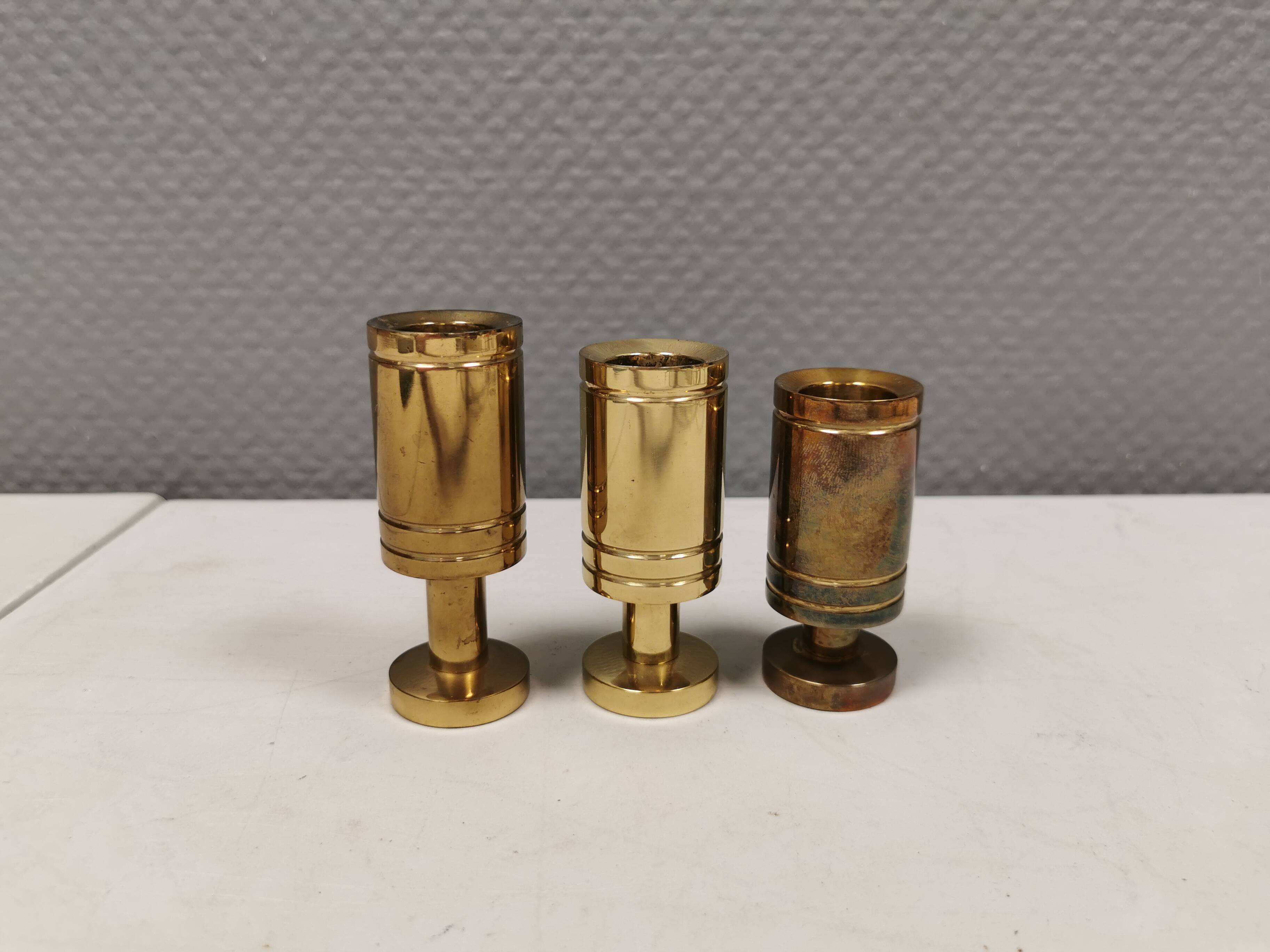 3 beautiful Danish designed candle holders in solid brass.