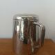 Silver-plated hammered metal teapot Art Deco