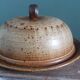 Stoneware cheese bell and platter from Puisaye, signed Jean-Pierre Prud’hom