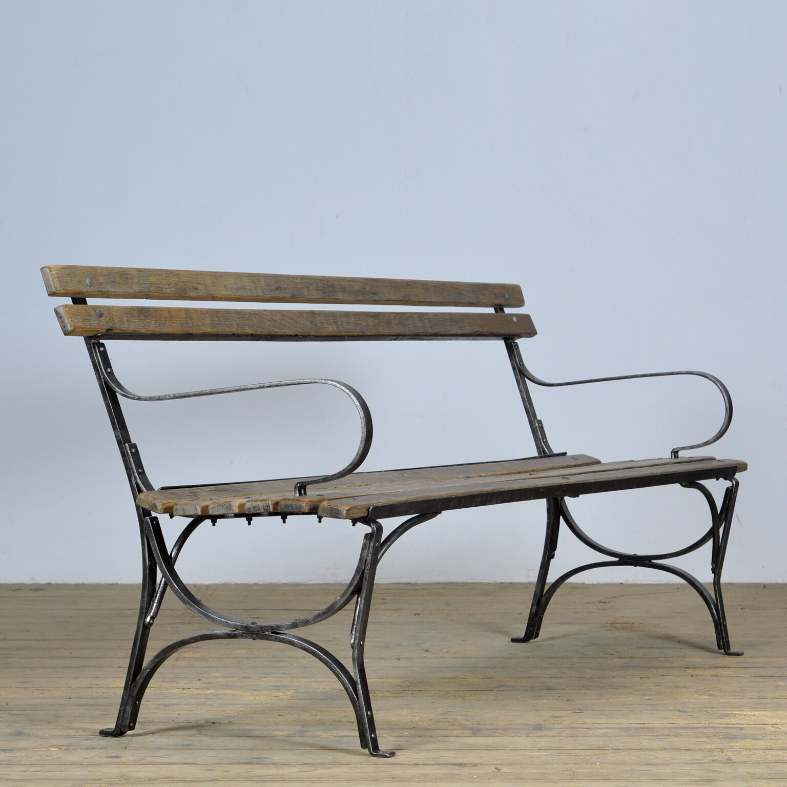 Riveted iron park bench 1920s