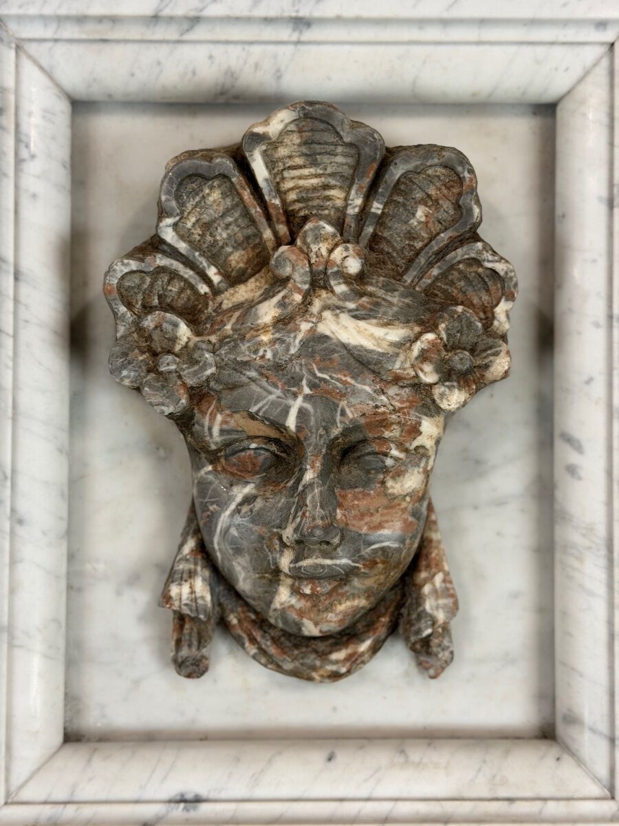 Female mascaron in grey Ardennes marble from the Regency period, 18th century.