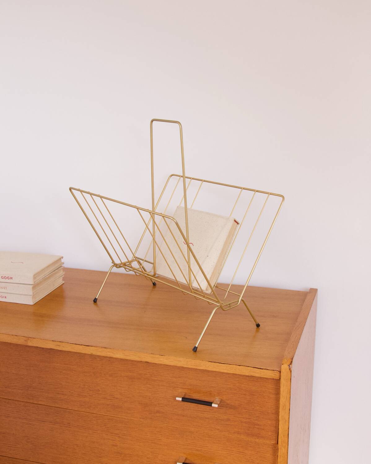 Vintage golden magazine rack