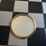 Round golden mirror