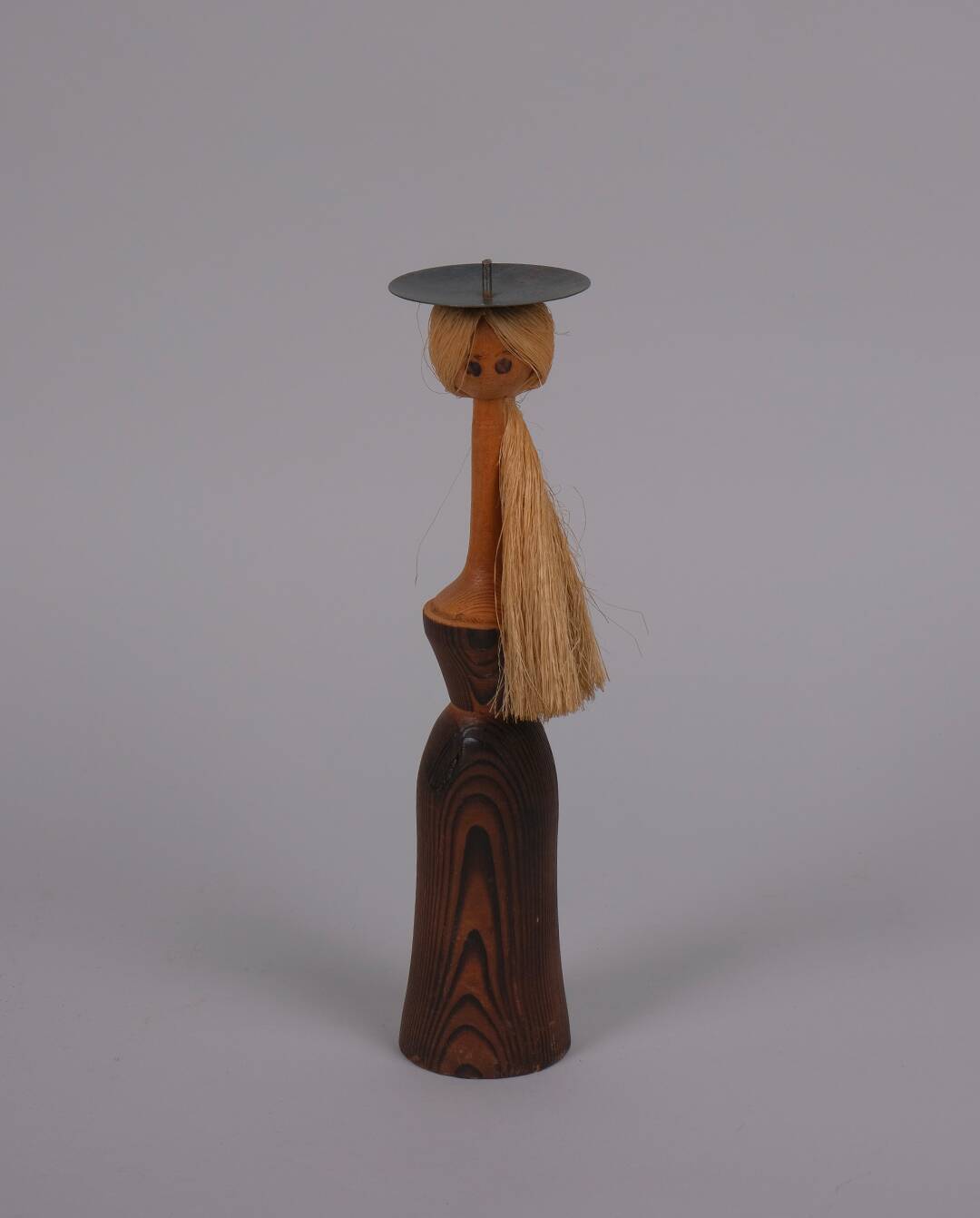 Anthropomorphic wooden candle holder