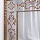 Miroir italien en verre églomisé, à parecloses, début XXe siècle