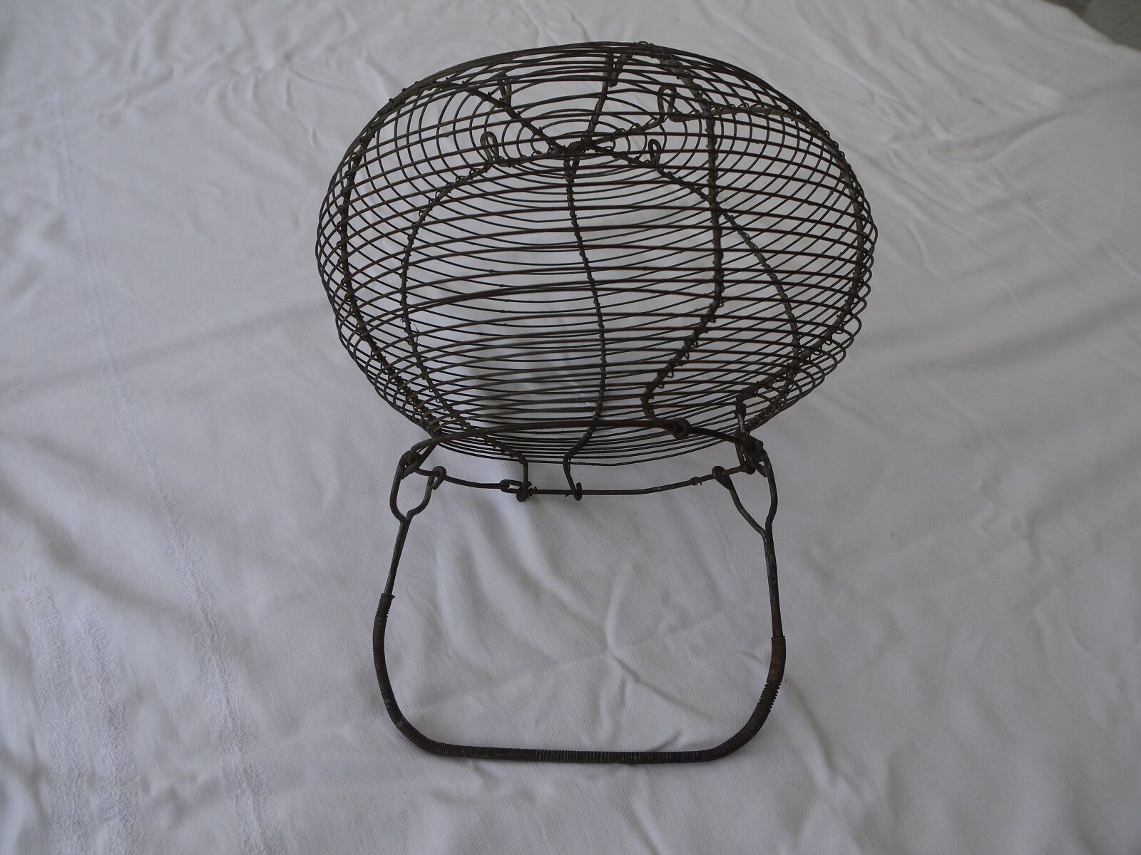 Old metal basket, egg