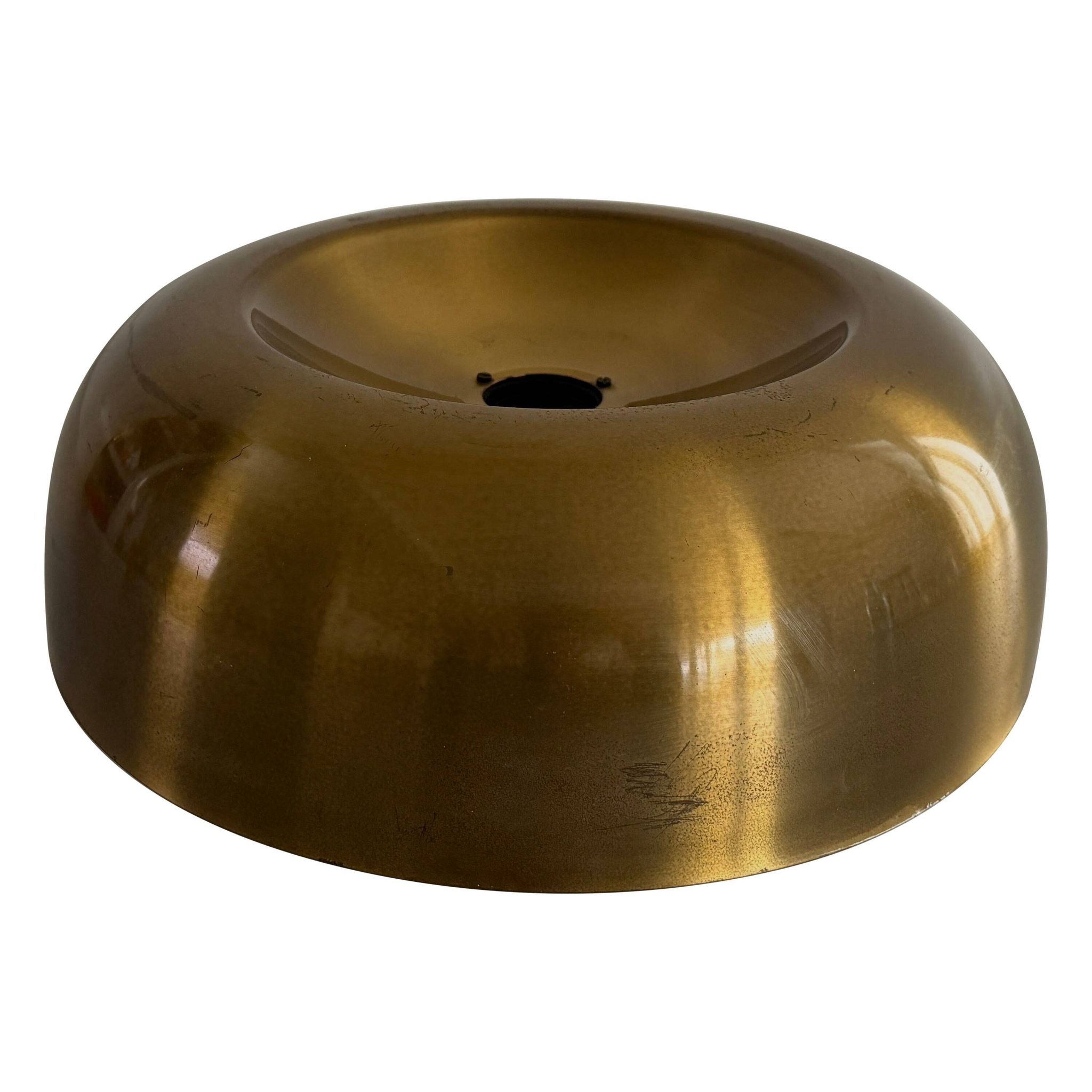 Flush-mounted disc-shaped brass fixture from the mid-century, 1960, Italy.