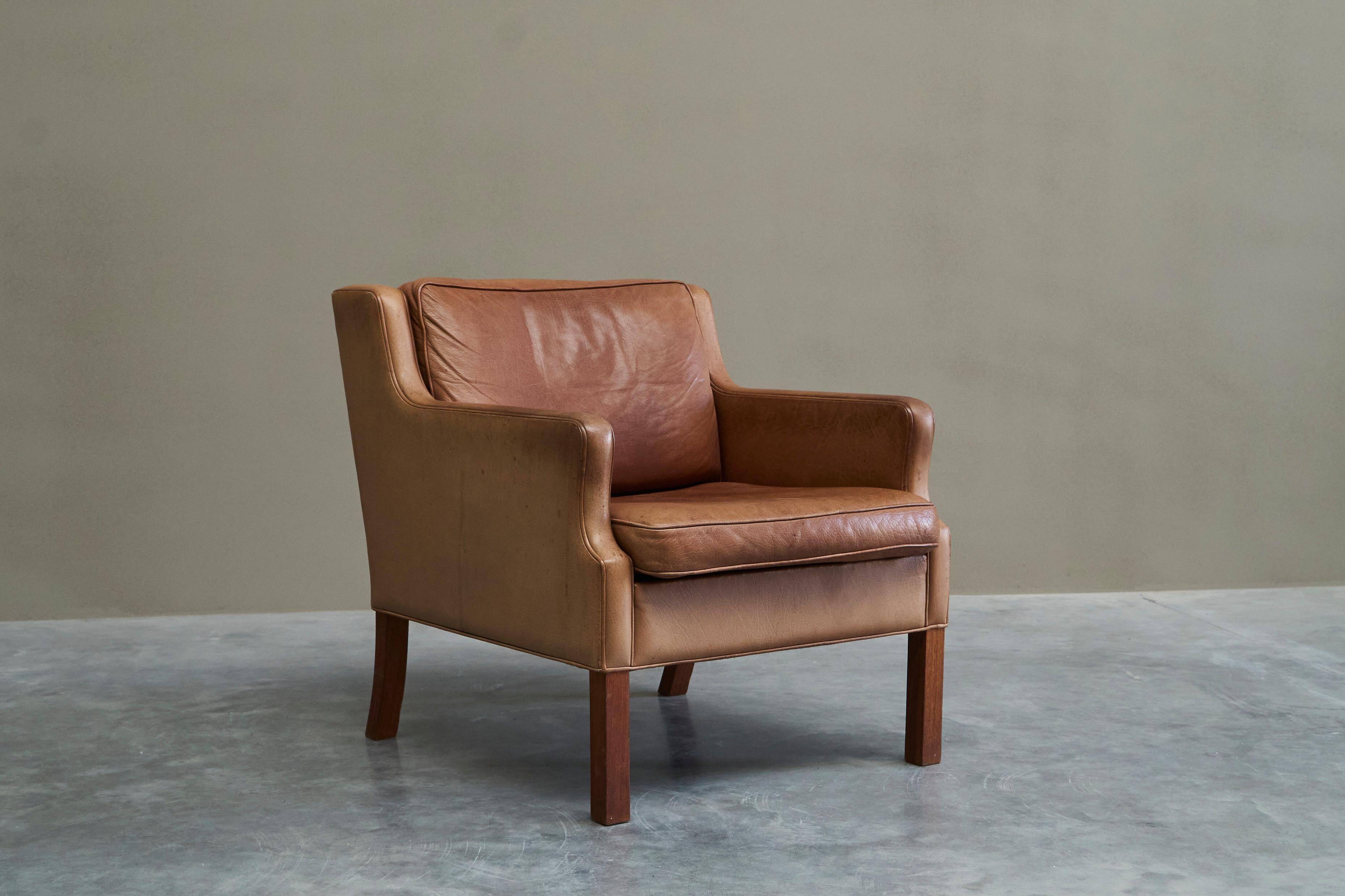 1970s patinated leather Scandinavian lounge chair