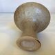 Beige ceramic chalice-shaped candle holder