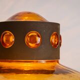 Pair of brass wall lamps with decorated amber coloured shades