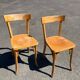 Set of two wooden bistro chairs