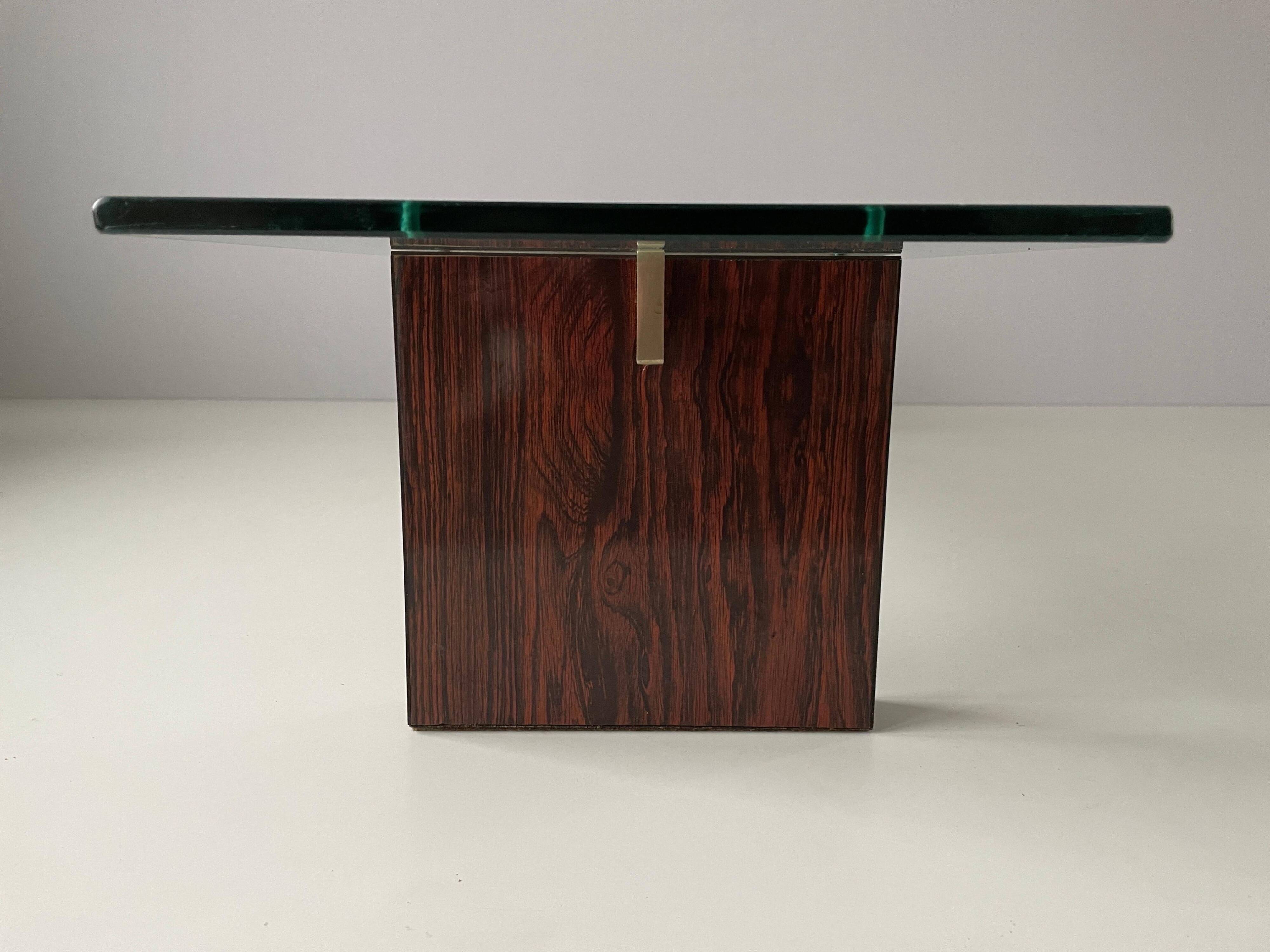 Mid-century minimalist thick glass coffee table, rosewood legs, 1960, Germany.