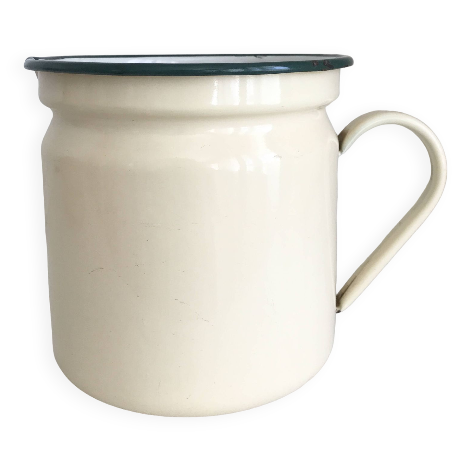 Old milk jug in enameled sheet metal