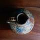 Hand-painted terracotta jug