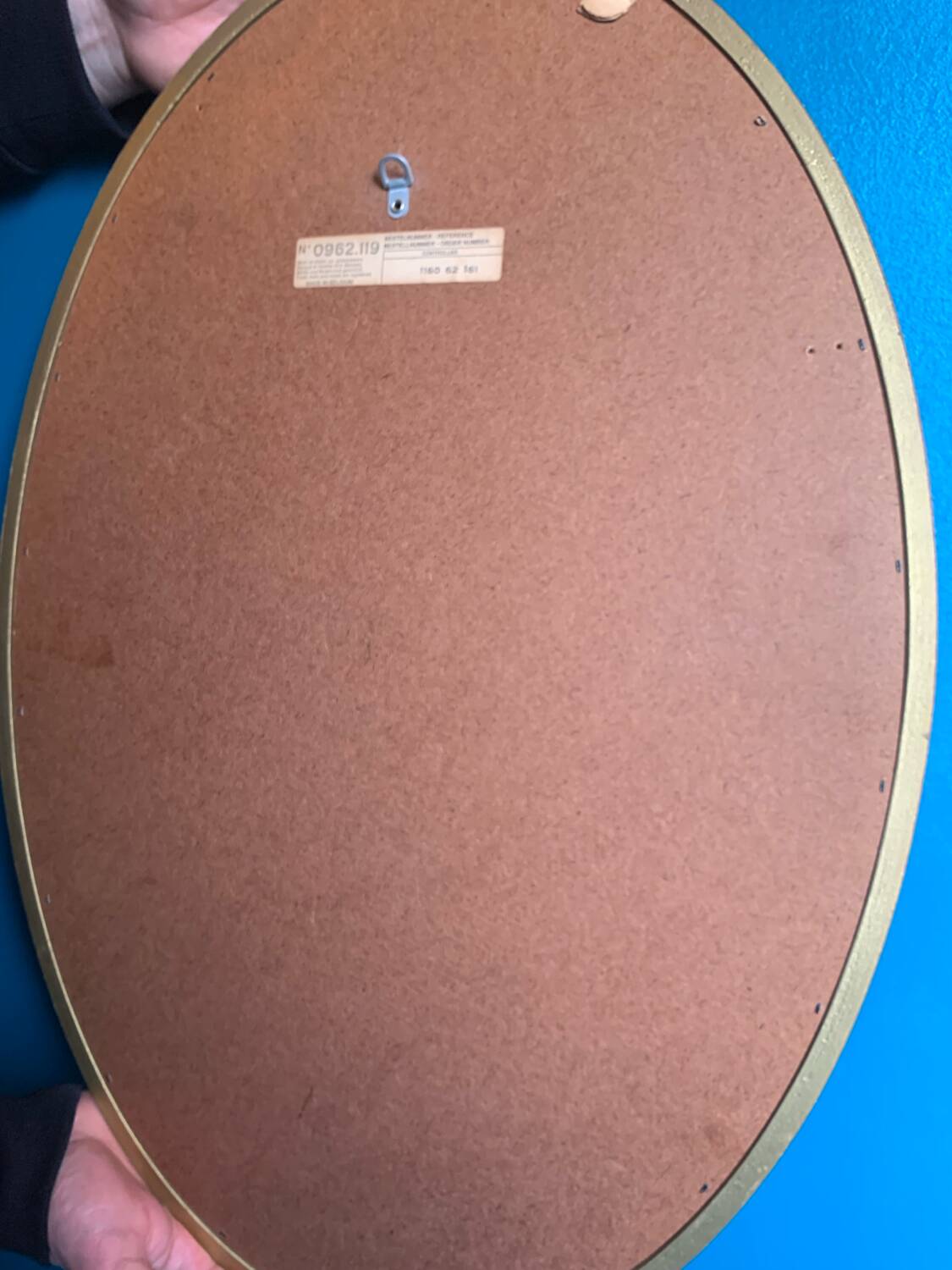 Vintage beveled gold oval mirror