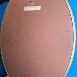 Vintage beveled gold oval mirror