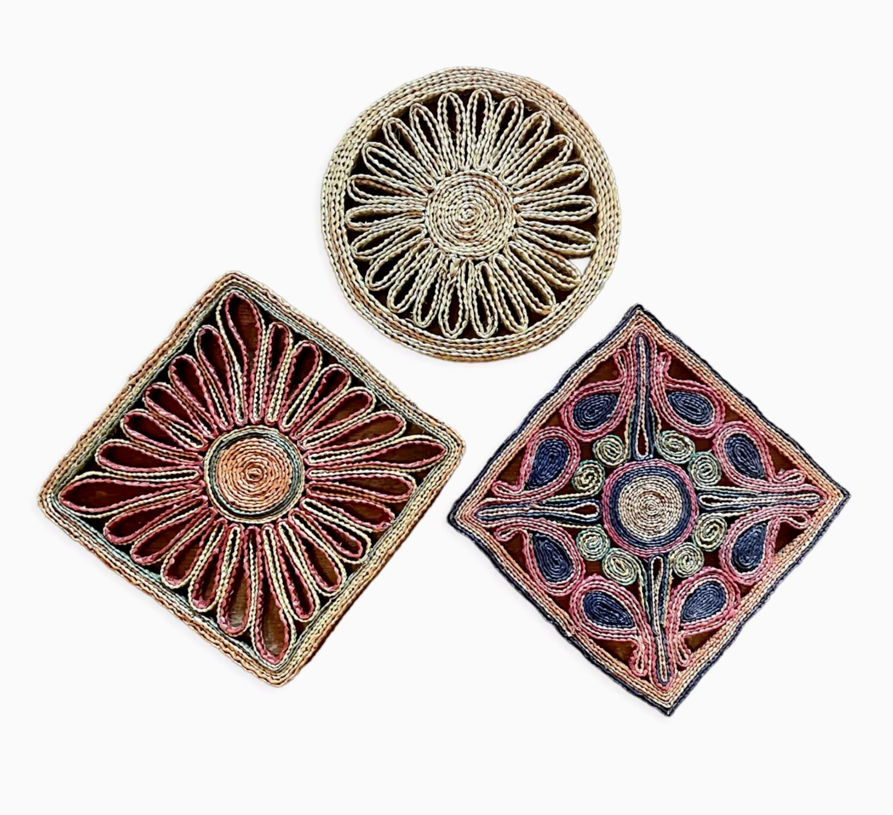 3 woven straw trivets
