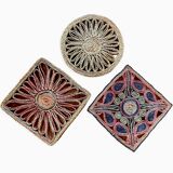3 woven straw trivets